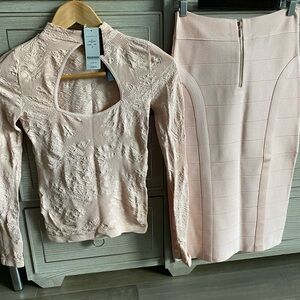Sold as a set BEBE bandage pencil skirt and stretch long sleeve top.